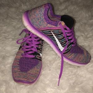 Barely worn, pink-rainbow Nike flyknits